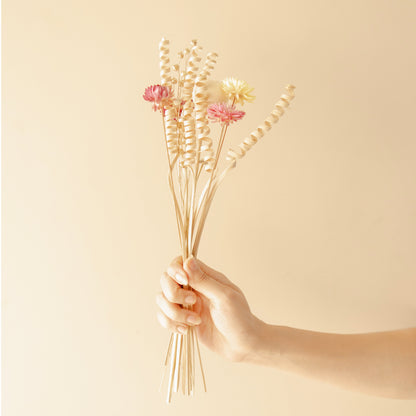 The Earthly vase with dried flower bunch