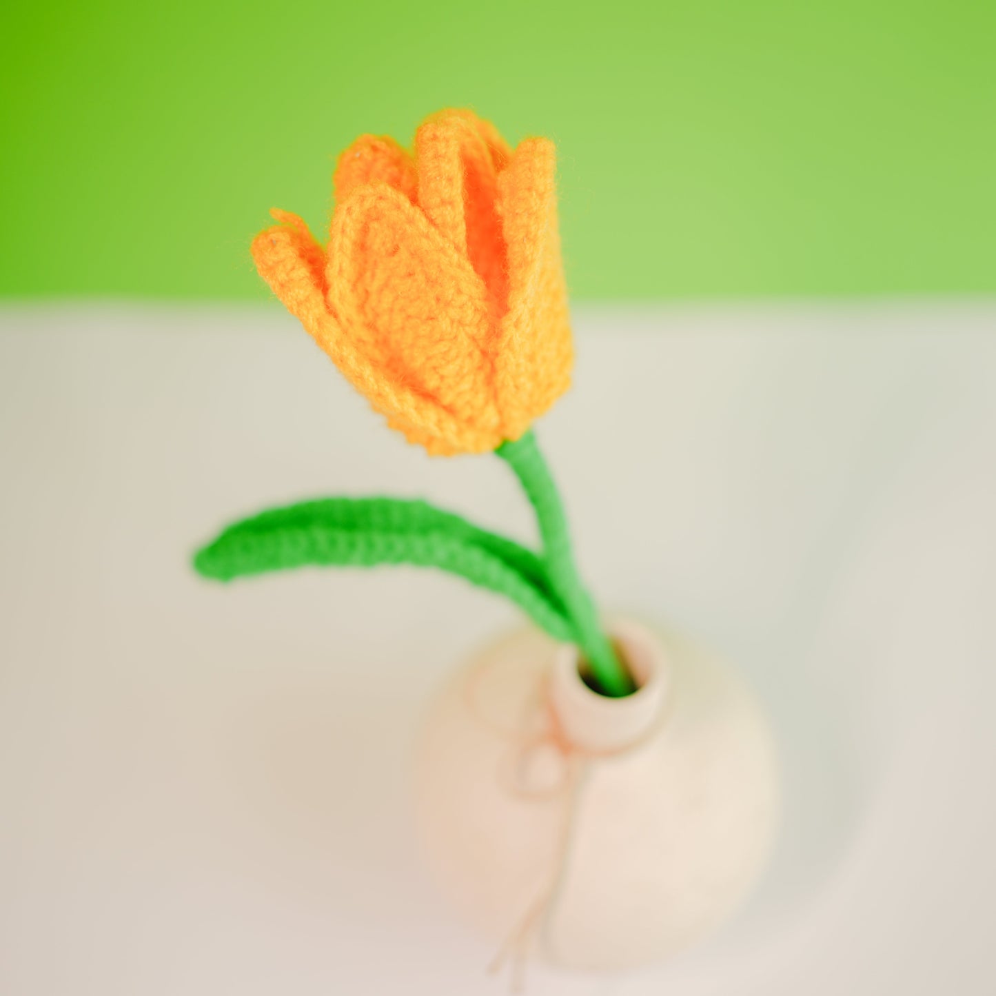 onion vase with yellow crochet tulip