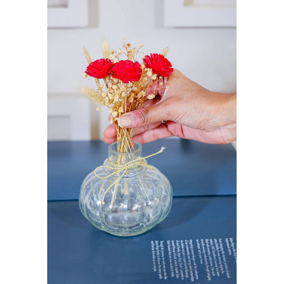 Mini glass bottle vase with red velvet bunch