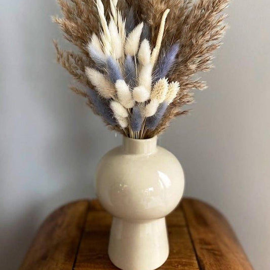 Mushroom vase with lilac bunch