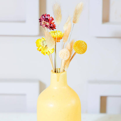 Bottle vase with summer breeze bunch