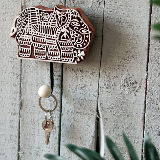 "Tusker Motif" hand carved wooden block key holder in Mango Wood