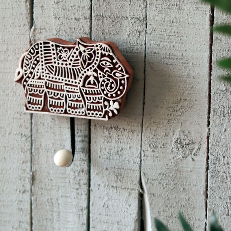 "Tusker Motif" hand carved wooden block key holder in Mango Wood