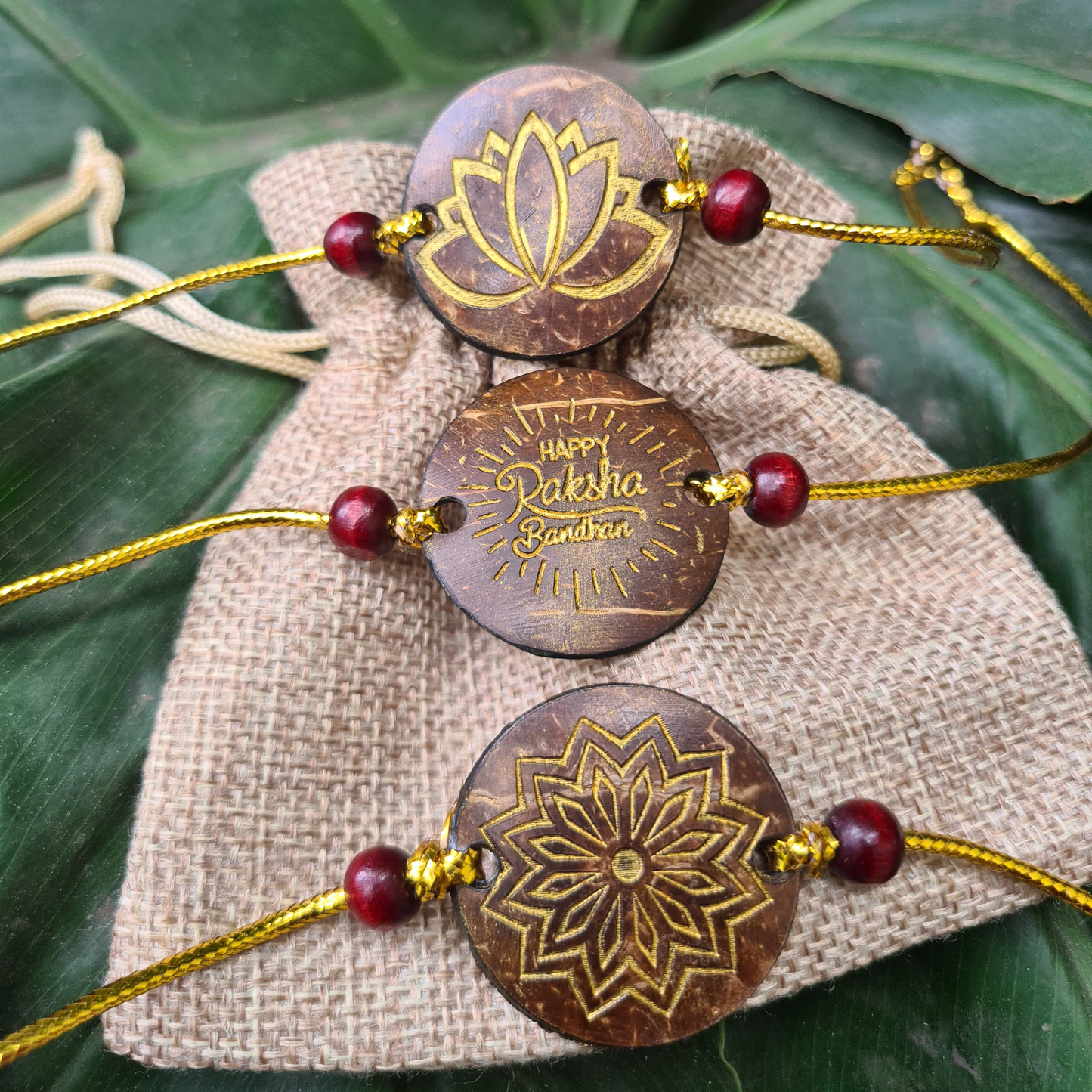 Thenga Eco-Friendly Coconut Shell Rakhis for Brothers (Includes 3 Rakhis, Jute Potli & Raksha Bandhan Card) - Set of 3