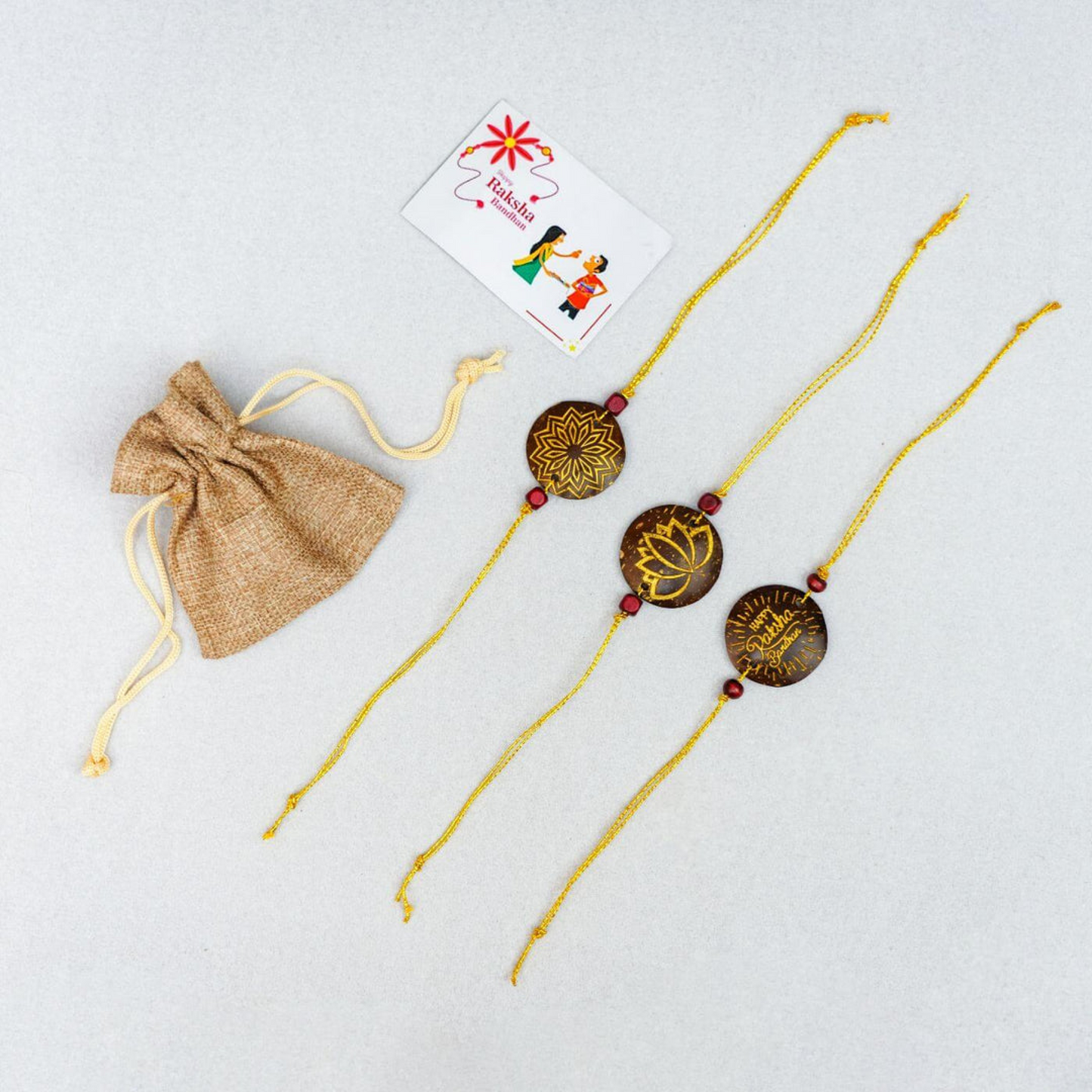 Thenga Eco-Friendly Coconut Shell Rakhis for Brothers (Includes 3 Rakhis, Jute Potli & Raksha Bandhan Card) - Set of 3