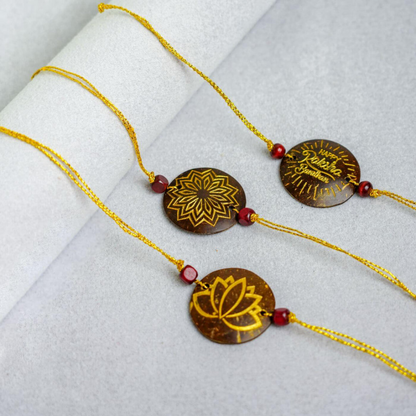 Thenga Eco-Friendly Coconut Shell Rakhis for Brothers (Includes 3 Rakhis, Jute Potli & Raksha Bandhan Card) - Set of 3